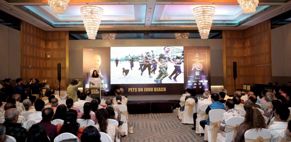 Book launch audience at The Club Juhu with Chitralekha branding