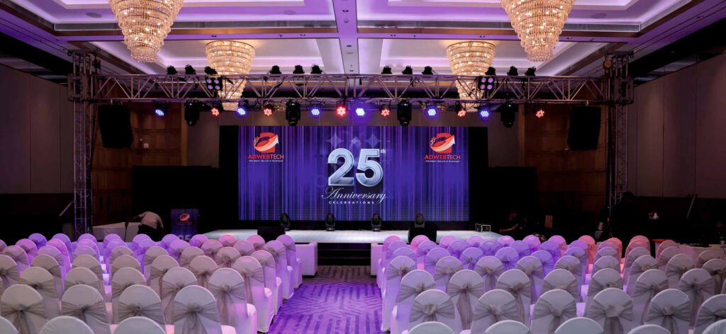 Adweb Technologies 25th Anniversary celebration stage with LED goalpost truss at The Club Mumbai by MRG Evennts